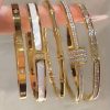 A luxurious set of 18k gold–plated stainless-steel bracelets featuring mixed designs with zircon stones, mother-of-pearl inlays, and chic modern shapes. each piece is waterproof, tarnish-free, and guaranteed to keep its color. elegant, feminine, and perfect for stacking to elevate any look.